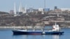 Vladivostok, Russia - A vessel sails with backdrop of the Russian far-eastern city of Vladivostok