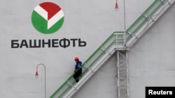 Russia -- An employee walks down stairs at Bashneft - Novoil refinery in the city of Ufa, Bashkortostan, April 11, 2013